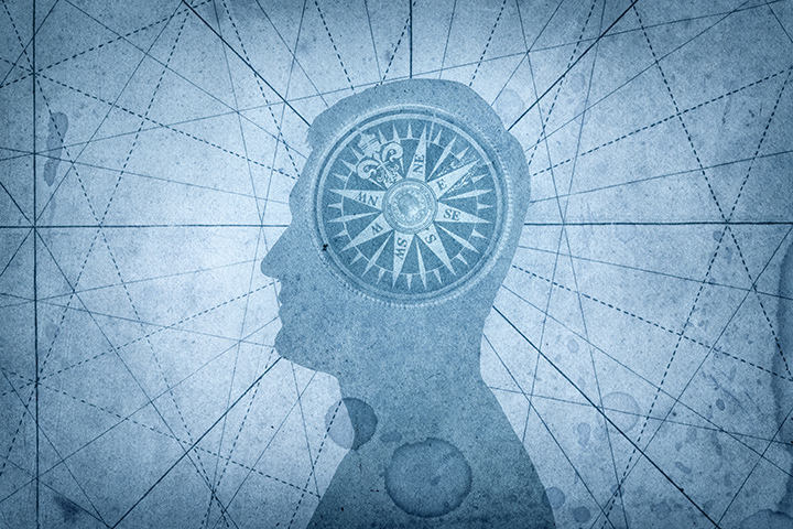 Zeichnung einer Männersilhouette mit einem Kompass im Kopf